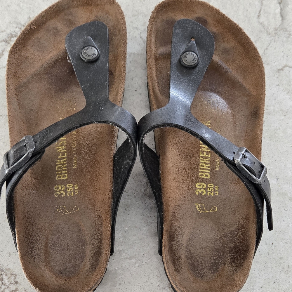 Birkenstock Black Sandals with Adjustable Straps and Contoured Footbed